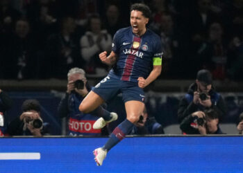 PSG fight back against Monaco to reach Champions League round of 16