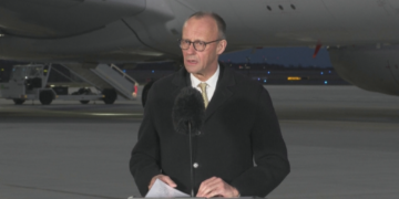 German Chancellor seeks "right balance" in his first official visit to China