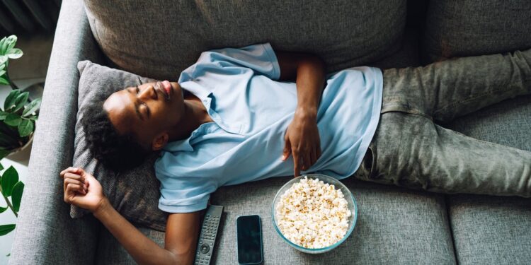 Why Do So Many People Fall Asleep Watching TV?